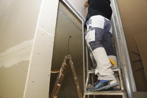 Construction Site Workers Prints: Craftsmen doing drywall work