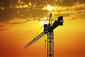 Industrial Estate Development Prints: Crane at sunset