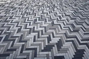 Deserted Cobblestone Street Prints: Creative structure with paving stones on sidewalk