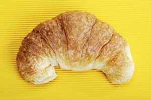 Breakfast Food Prints: Croissant on a yellow surface