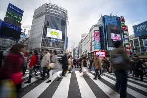 Colorful Cityscape Prints: Crowd crossing zebra crossing on a large intersection