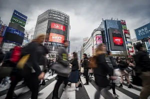 Crowded City Streets Prints: Crowd crossing zebra crossing on a large intersection