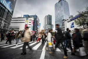 Road Traffic Congestion Prints: Crowd crossing zebra crossing on a large intersection