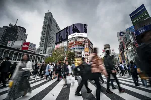Colorful Cityscape Prints: Crowd crossing zebra crossing on a large intersection