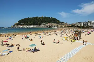 Spanish Coastline Images Prints: Crowded beach with people in August