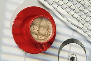 Isolated Coffee Cup Prints: Cup of coffee, DCs and keyboard on a studio background