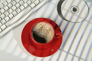 Isolated Coffee Cup Prints: Cup of coffee, DCs and keyboard on a studio background