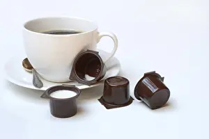 White Background Coffee Prints: Cup of coffee and milk in portion pack