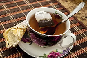 Food Still Life Images Prints: Cup of tea with pastry after dinner