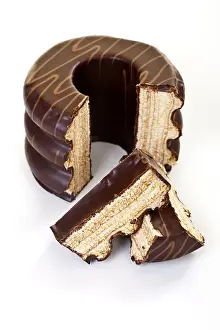 Chocolate Desserts Prints: Cut spit cake