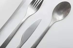 White Table Setting Prints: Cutlery on white table. Minimal designed fork