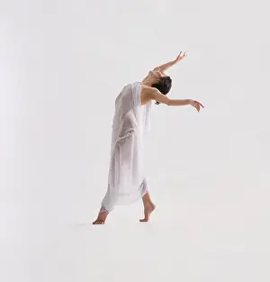 Dancer In Motion Prints: A dancer moves expressively in a spacious
