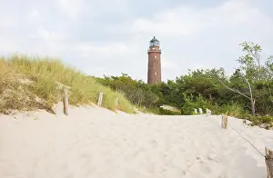 Darsser Ort Lighthouse Prints: DarBer Ort lighthouse rises behind the path to the beach