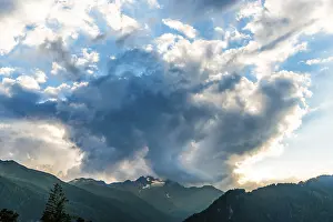 High Mountain Range Europe Prints: Dark clouds over Alpine panorama