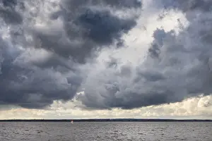 Wetland Biotope In Northern Germany Prints: Dark clouds over Lake Dummer