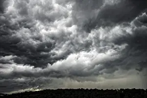 Cloudy Sky Over Europe Prints: Dark storm clouds, thunderstorms