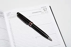 Time Management Tools Prints: Day planner with a pen
