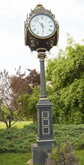 Deserted City Square Europe Prints: DEcorative clock on Unirii square