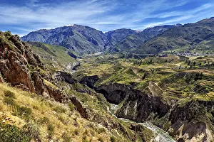 Mountainous Agricultural Land Prints: Deep gorge with river and terraced fields in the mountains