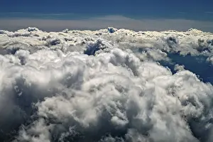 Weather Forecast Images Prints: Dense cloud cover under a blue sky
