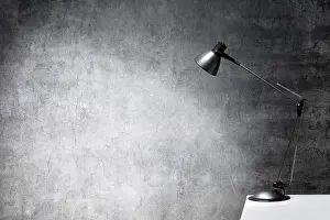 Empty Room Lighting Prints: Desk lamp on the edge of a table