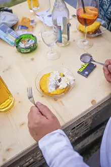 Exotic Fruit Photography Prints: Dessert with pineapple and cream on a table with drinks