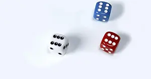 Bright Studio Background Image Prints: Dice rolling against White background