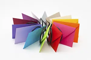 Plain White Background Images Prints: Different colored envelopes on the white table