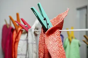Images Dated 31st May 2024: Different Colored Kitchen Towels on a Clothesline Print