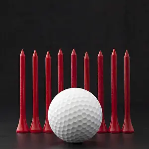 Recreational Activity Images Prints: Different golf balls on the black table