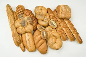 Flour Based Baked Goods Prints: Different kinds of bread on a studio background