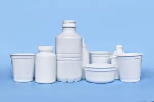Plastic Waste Disposal Prints: Different plastic waste packages on blue background
