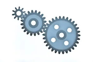 Studio Shot Of Gears Prints: Three different sized plastic gear wheels