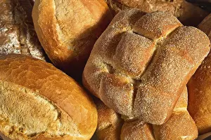 Diverse Breakfast Options Prints: Different types of bread in one basket