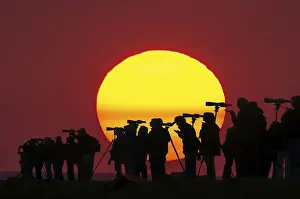 Europe Evening Atmosphere Prints: Digital composing, people with telescopes in front of setting sun