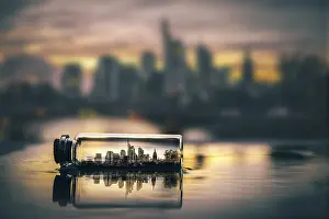 Deserted Cityscape Europe Prints: Digital Composing, skyline at sunset in a message in a bottle