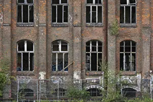 Wall Mural Prints: Red Brick Facade Print with Graffiti and Broken Windows