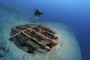 Red Sea Egypt Prints: Diver looking at bow thrusters on shipwreck