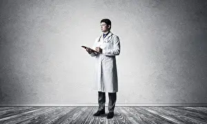 Self Confident Doctor Prints: Doctor with a tablet with documents