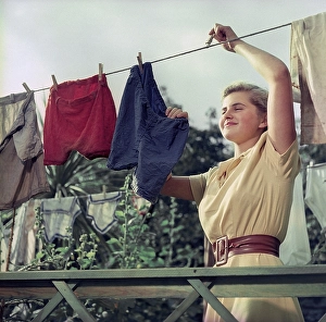 Young Woman Cleaning Prints: Doing the laundry in the 1950s