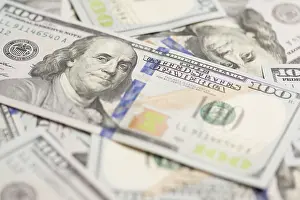 US Dollar Note Close View Prints: One hundred dollar bills laying on flat surface