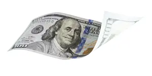 US Dollar Banknote Prints: One hundred dollar bill falling or floating on empty background