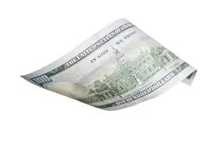 White Background Currency Symbol Prints: One hundred dollar bill falling or floating on empty background