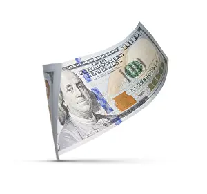 One Hundred Dollar Bill Prints: One hundred dollar bill floating down to surface with drop shadow isolated on a white background