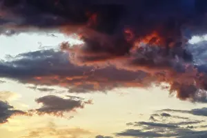 Dramatic Cloud Sky Prints: Dramatic cloud sky at sunset, intense colors