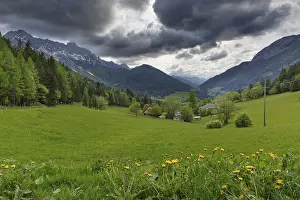 Cloudy Day In The Alps Prints: Dramatic clouds over the alpine landscape