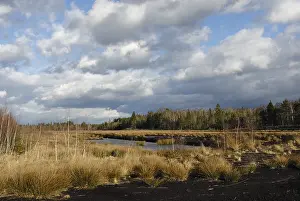 Dramatic Cloud Formation Prints: Dramatic clouds forming over a former peat bog
