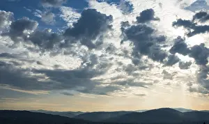 Cloud Formations Europe Prints: Dramatic clouds and silhouette of hills