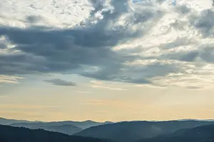 Atmospheric Evening Shot Prints: Dramatic clouds and silhouette of hills
