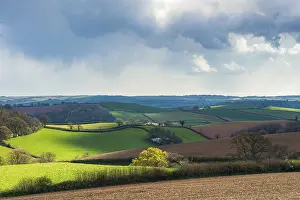 British Countryside Prints: Dramatic clouds and sky over fields of Berry Pomeroy